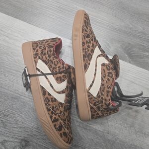Madden NYC fold-over leopard print sneakers.